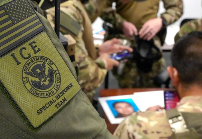 ICE officers in fatigues