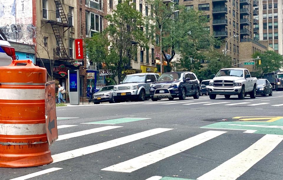 Cars driving down Second Avenue in Manhattan