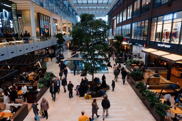 People conversing at Generic mall