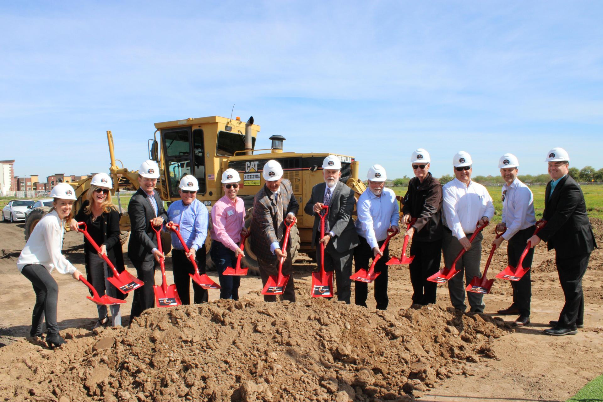 Julie Harris, Jennifer Hill, Ken Gatt, Bill Toops, Robert Heidt, Walt Brown, Jerry Weires, Ed Bull, Ian Hugh, Rick Weiss, Brian Greathouse, Brian Friedman take part in the March 17 groundbreaking ceremony for En Fuego in Glendale. 