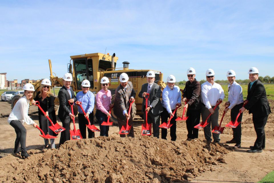 Julie Harris, Jennifer Hill, Ken Gatt, Bill Toops, Robert Heidt, Walt Brown, Jerry Weires, Ed Bull, Ian Hugh, Rick Weiss, Brian Greathouse, Brian Friedman take part in the March 17 groundbreaking ceremony for En Fuego in Glendale. 