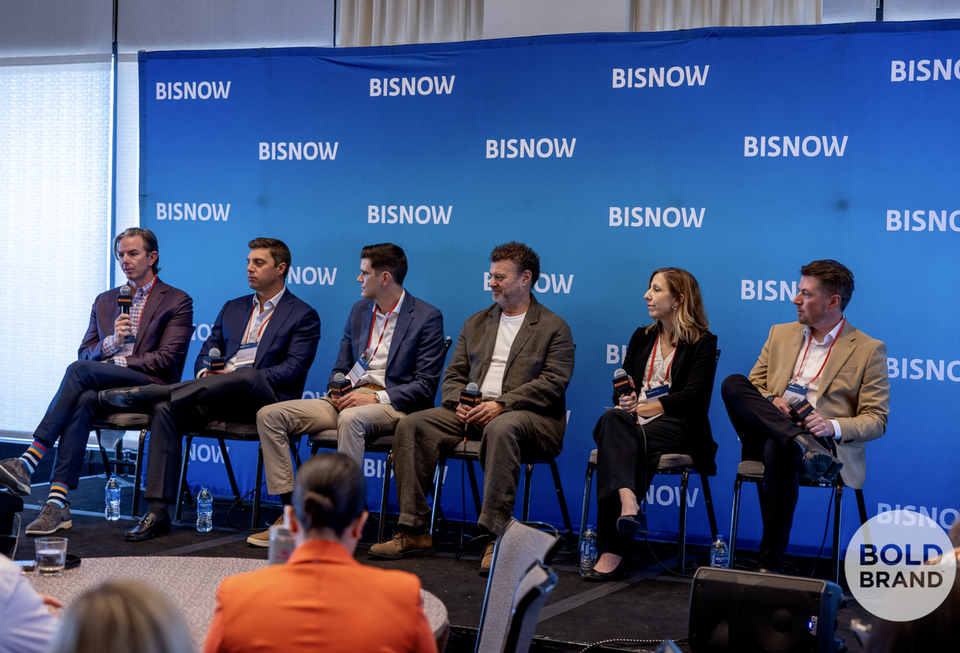 A high-resolution professional photo of the Investment and Market Fundamentals: Data-Driven Decisions for 2025 panel at Bisnow's Multifamily Annual Conference Rockies