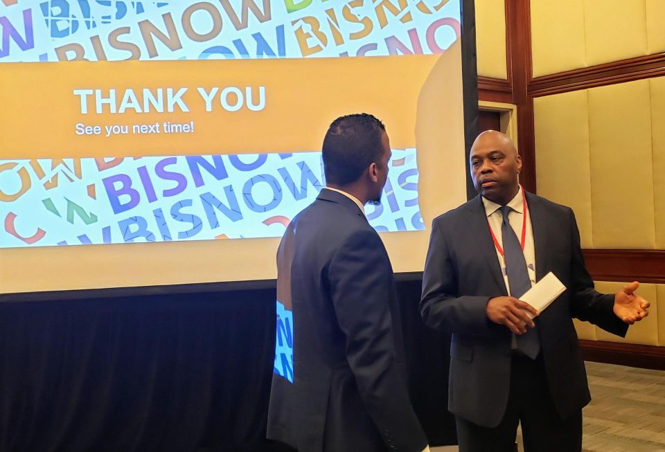 Los Angeles County Metropolitan Transportation Authority CEO Phillip Washington speaks to an attendee at Bisnow's Long Beach Boom! event July 23 at the Westin Long Beach
