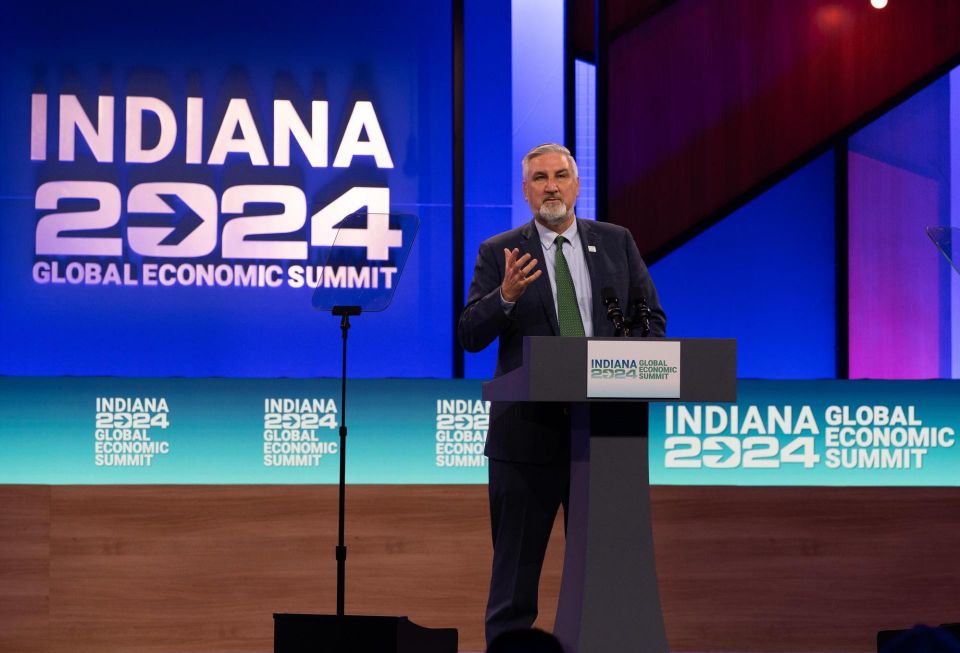 Indiana Gov. Eric Holcomb delivering remarks at the Indiana 2024 Global Economic Summit, where he announced a $5.3B manufacturing investment from Eli Lilly.