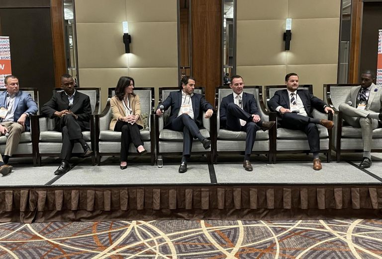 Drew Enstice of ARCO Design/Build Industrial, Debo Ayeni of Alex. Brown Realty, Danielle Schline of Prologis, Price Booker of Realterm, Kerry Doyle of Tradepoint Atlantic, Keith Edwards of Brookfield Properties and Remington Mignott of SGC Power speak during a panel at Bisnow's 2022 Mid-Atlantic Industrial Summit in Baltimore.
