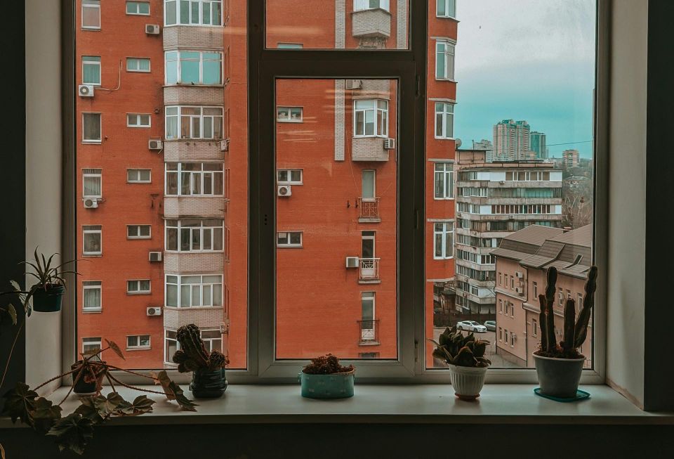 Apartment building through a window