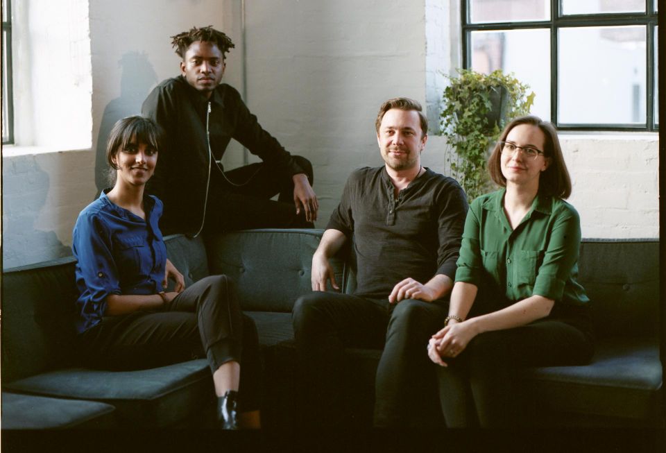 Lane founders Kofi Gyekye and Clint Robinson with other members of the Lane team.