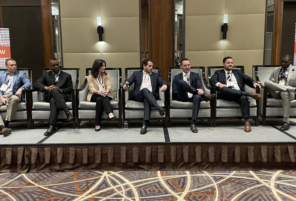Drew Enstice of ARCO Design/Build Industrial, Debo Ayeni of Alex. Brown Realty, Danielle Schline of Prologis, Price Booker of Realterm, Kerry Doyle of Tradepoint Atlantic, Keith Edwards of Brookfield Properties and Remington Mignott of SGC Power speak during a panel at Bisnow's 2022 Mid-Atlantic Industrial Summit in Baltimore.