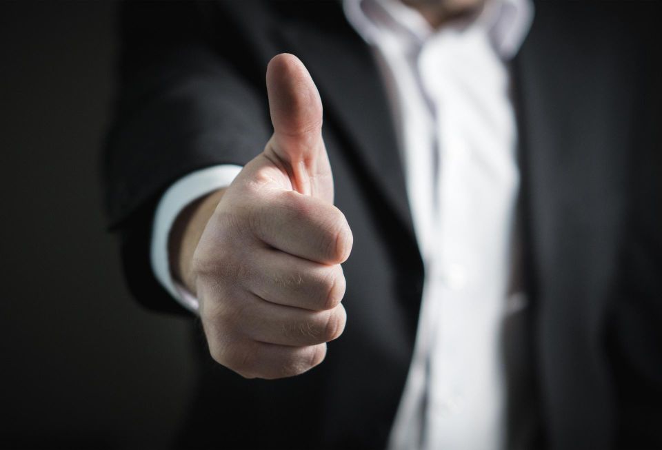 thumbs up success