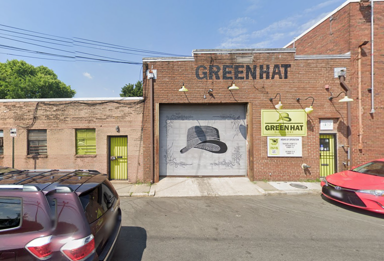 Exterior of the now-closed Green Hat Distillery space on Fenwick Street NE