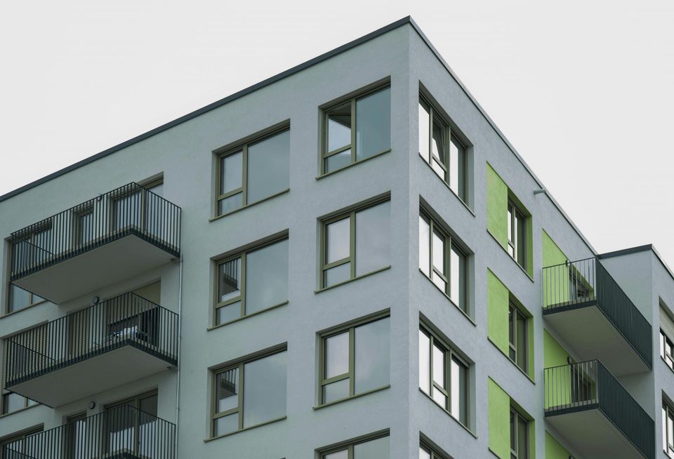 multifamily apartments grey gray apartment building