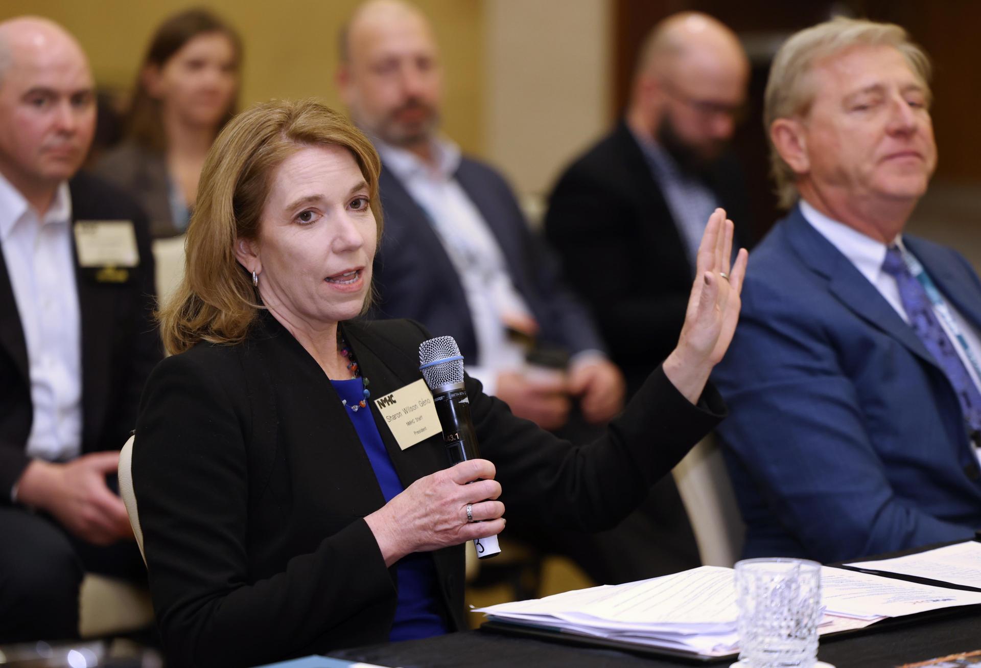 NMHC President Sharon Wilson Géno, joined by NMHC Vice Chair and CEO of Continental Properties, James Schloemer, briefs NMHC members on the state-of-play in Washington