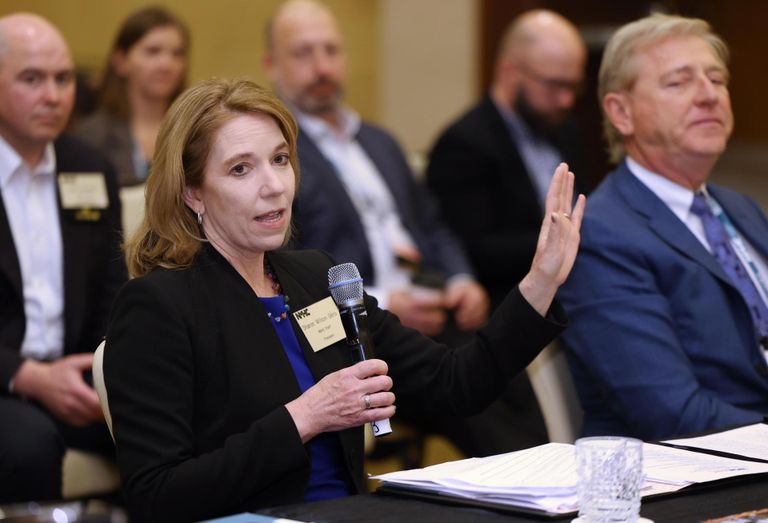 NMHC President Sharon Wilson Géno, joined by NMHC Vice Chair and CEO of Continental Properties, James Schloemer, briefs NMHC members on the state-of-play in Washington