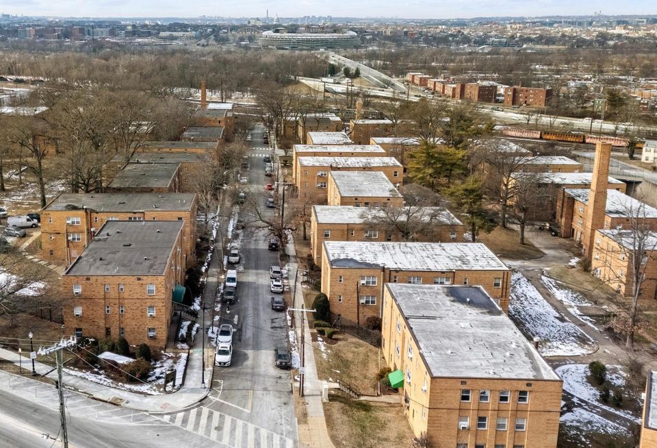 The 51-building Meadow Green Courts complex is scheduled for a foreclosure auction March 12.