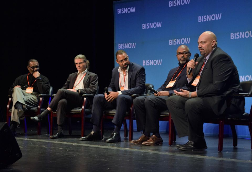 Anacostia Economic Development Corporation's Stan Jackson, Redbrick's Tom Skinner, Standard Real Estate Investments' Jerome Nichols, Banneker Ventures' Omar Karim and The Menkiti Group's Bo Menkiti speak during a panel at Bisnow's Future of Wards 7 and 8 event on Dec. 13, 2022.