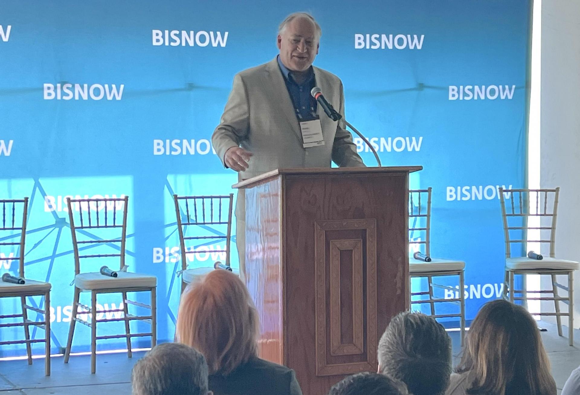 Montgomery County Executive Marc Elrich speaking at Bisnow's Mid-Atlantic Life Sciences and Biotech Summit. 