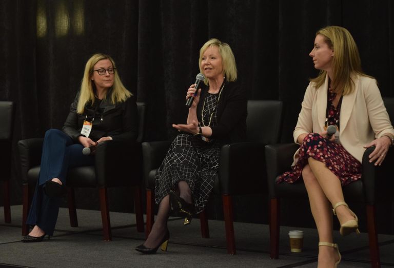 Caroline Kenney of Urban Atlantic, Gale Morgan of Mather LifeWays, and Cheri Clarke Doyle of Trammell Crow Co. speak during a panel at Bisnow's 2022 Mid-Atlantic Senior Housing Summit.