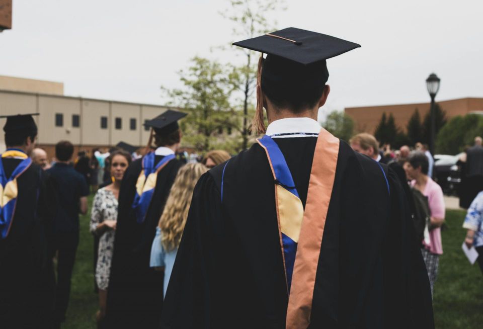 a photo depicting an African American college grad