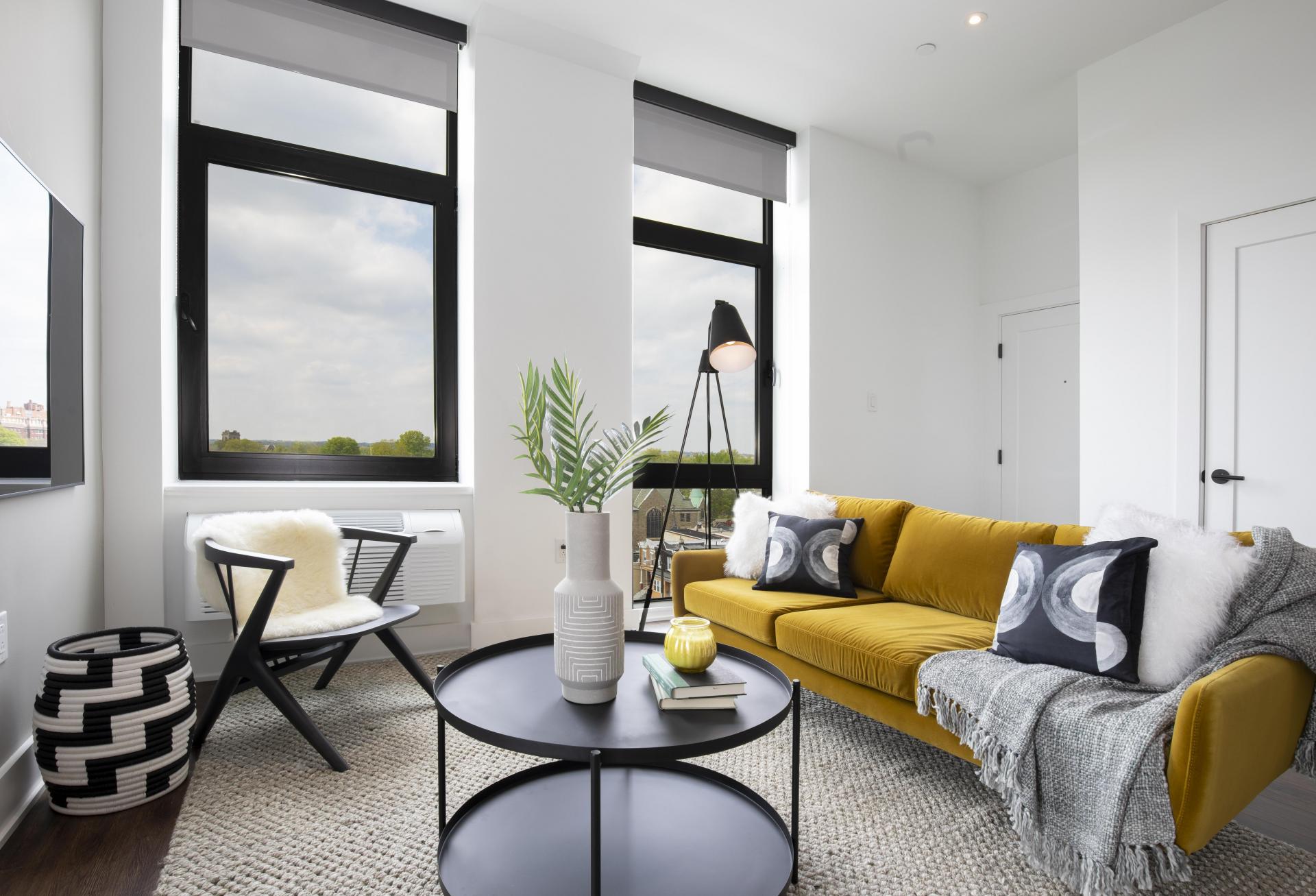 A living room with aluminum windows.