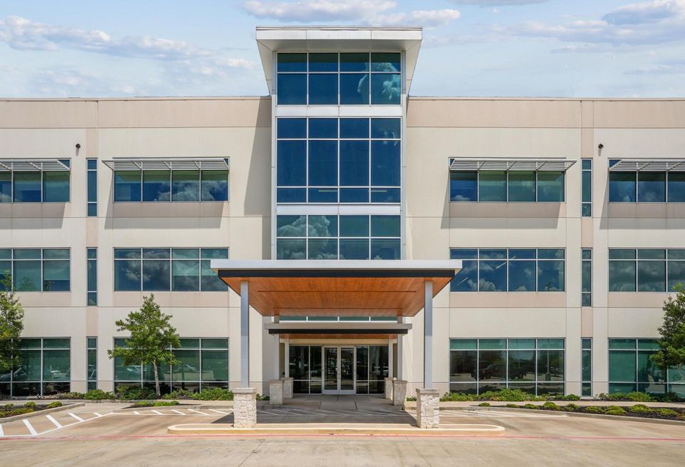 The entrance and exterior of a three-story medical office building