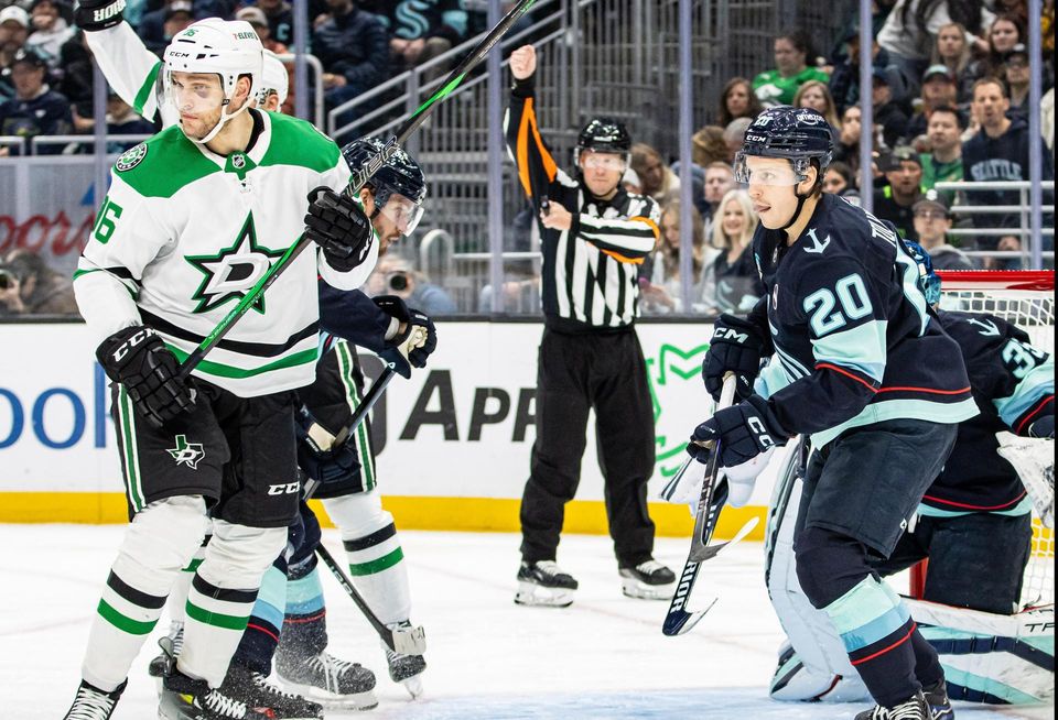 The Dallas Stars' Mikko Rantanen and Seattle Kraken's Eeli Tolvanen during an NHL match on 3/29/25.