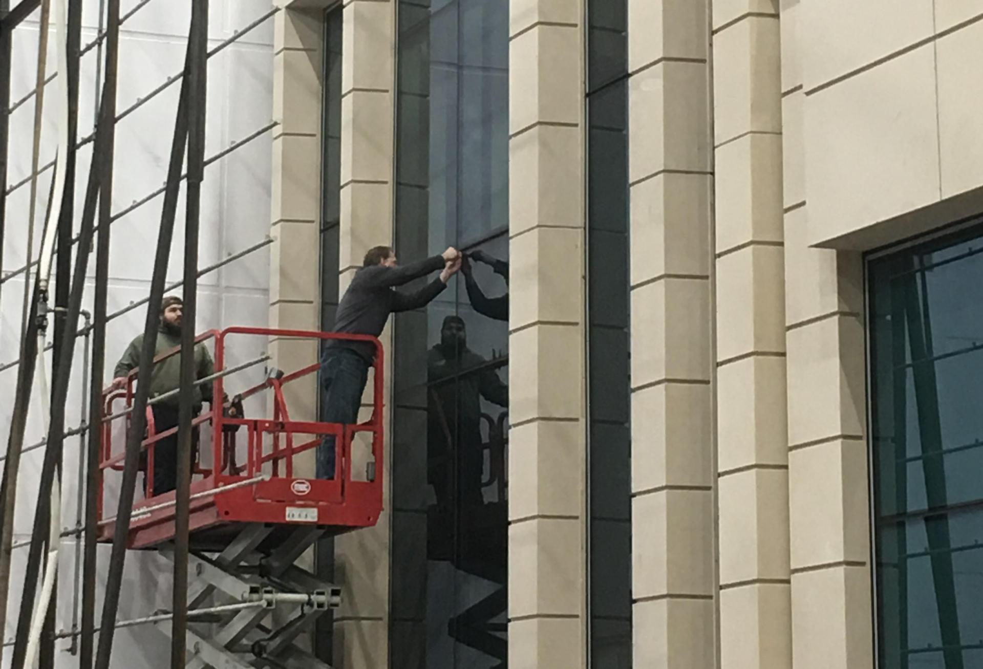 Glenn Johnson reviewing curtainwall installation