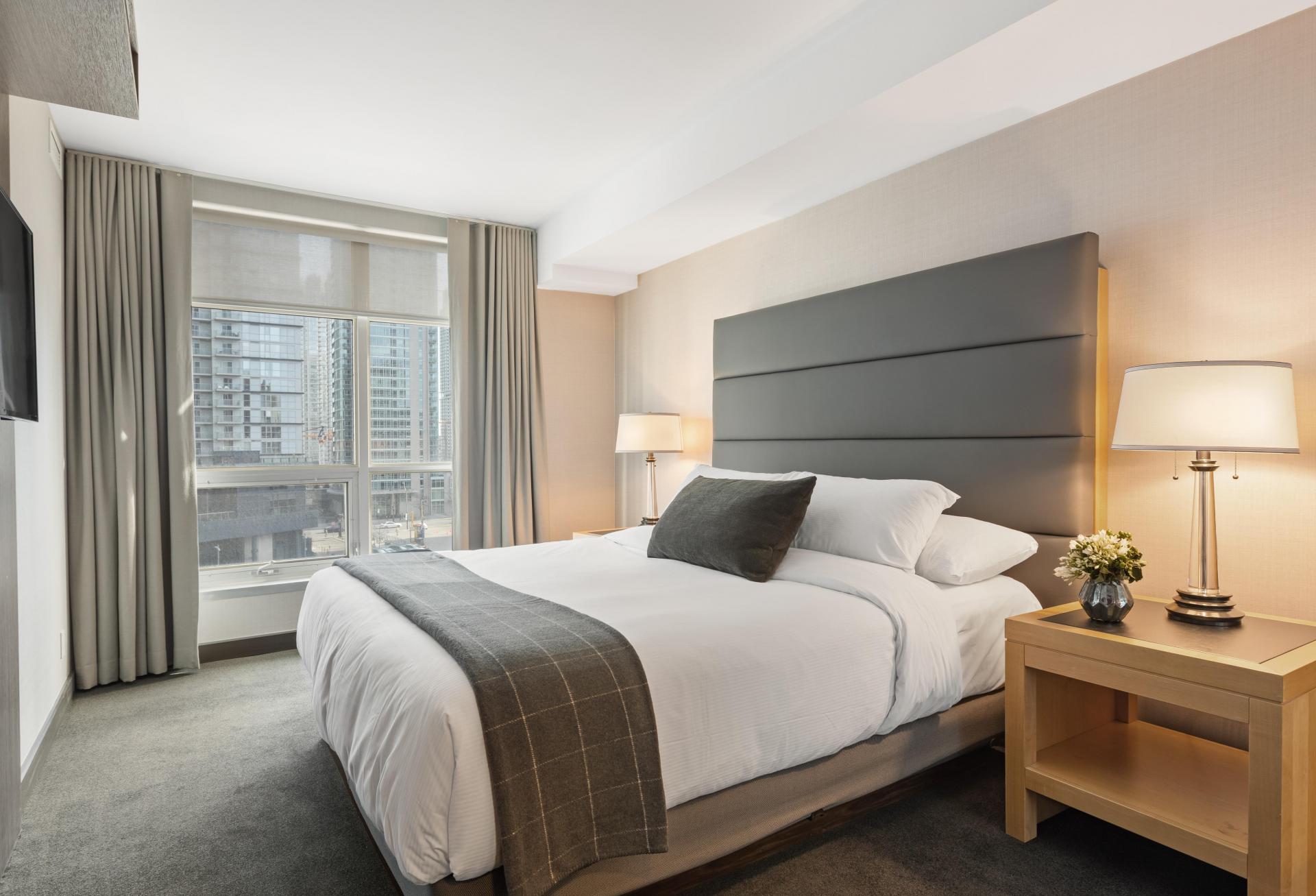 A bed in a hotel room 