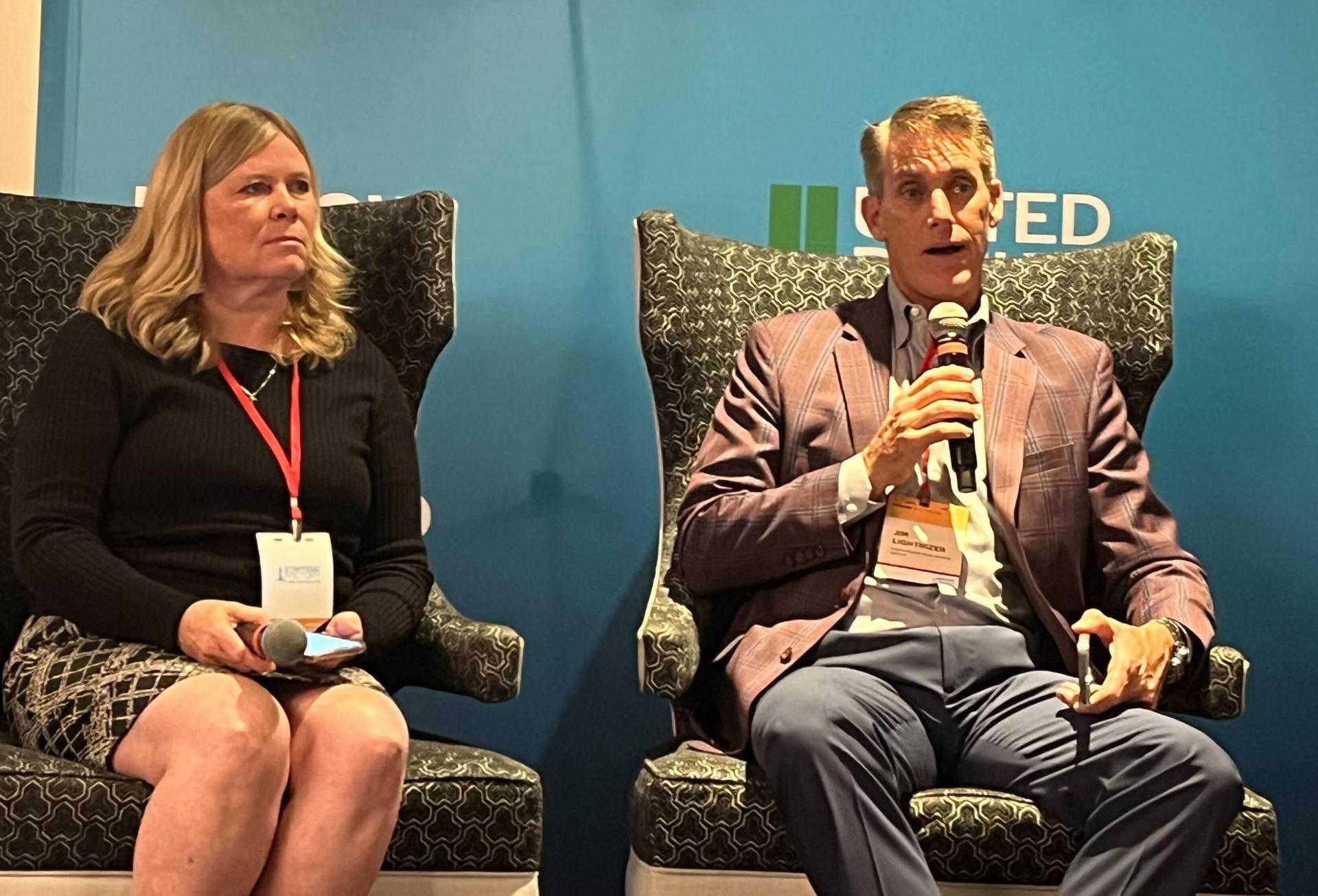 Harrington Commercial Real Estate's Terri Harrington and Chesapeake Real Estate Group's Jim Lighthizer speaking at Bisnow's Baltimore State of the Market event Oct. 5. 