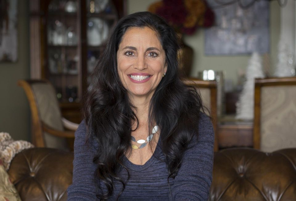 American National Investments Chair and CEO Gina Champion-Cain