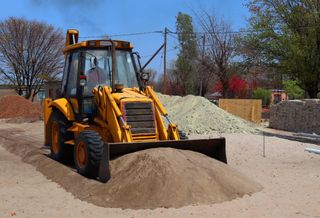 Bull dozer pushing dirt