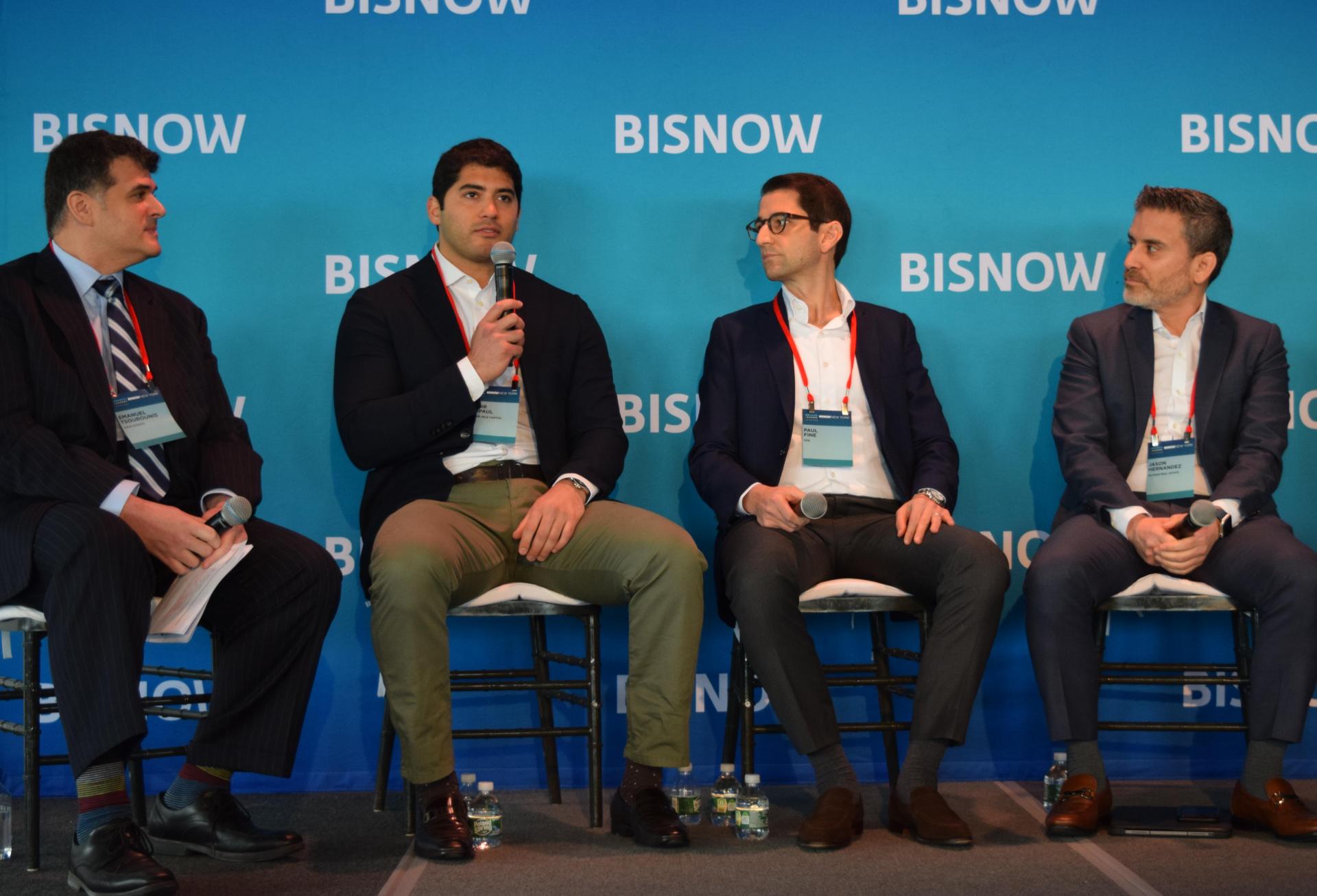 Cole Schotz's Emanuel Tsourounis, Square Mile's Samir Tejpaul, KKR's Paul Fine and Nuveen Real Estate's Jason Hernandez on stage at Bisnow's New York Future Forum in January 2023.