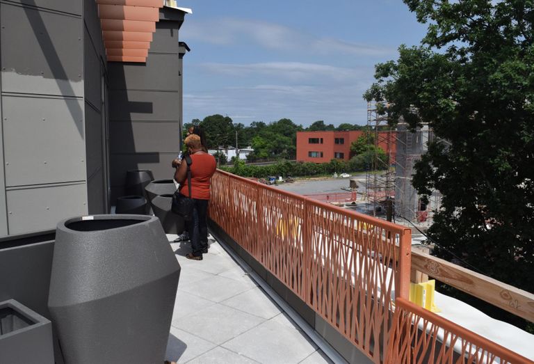 The balcony on the top floor of Entwine. The project is three blocks from the Takoma Metro station.