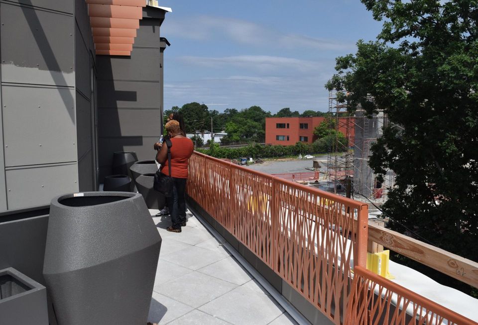 The balcony on the top floor of Entwine. The project is three blocks from the Takoma Metro station.