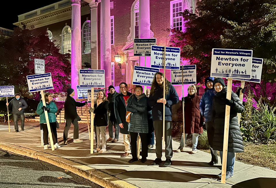 Newton For Everyone organizers outside of Newton City Hall on Monday night.