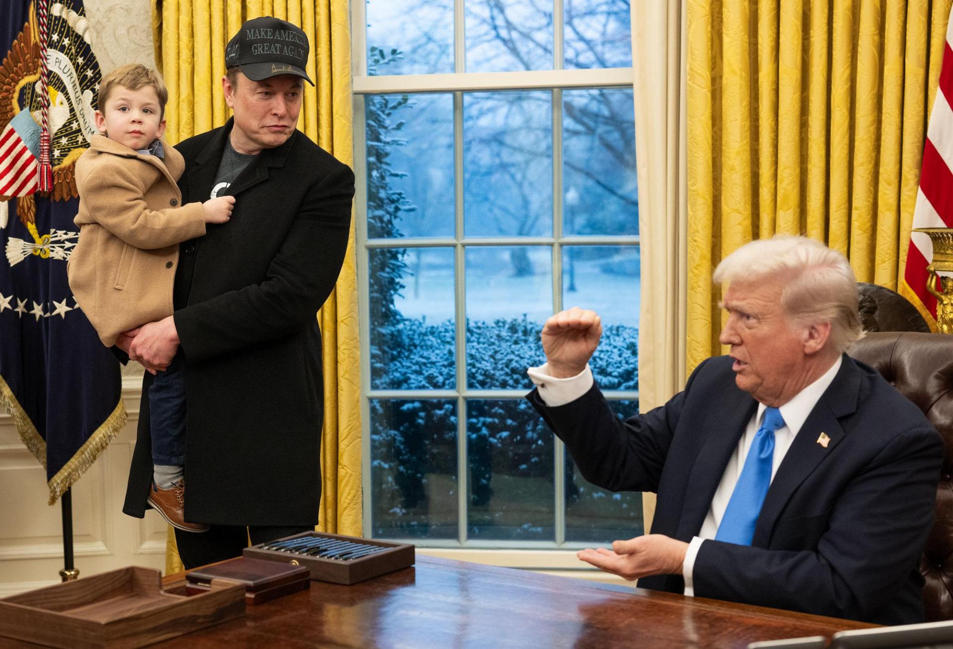 Elon Musk and his son with President Donald Trump in the Oval Office. Elon Musk and his son with President Donald Trump in the Oval Office.