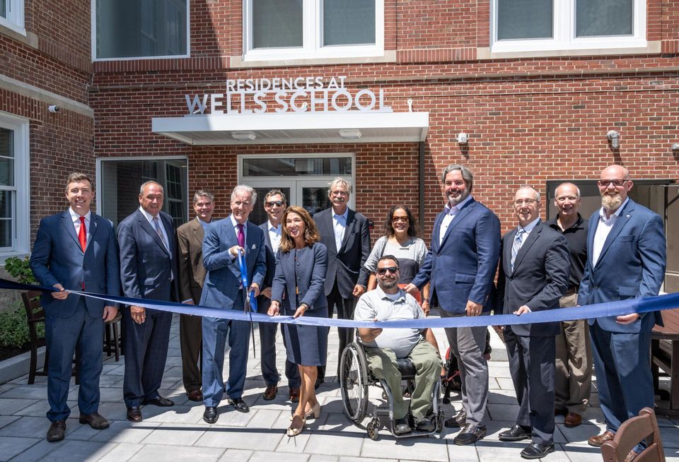Ribbon cutting at the Wells School.