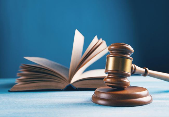 gavel and paperwork gavel and book