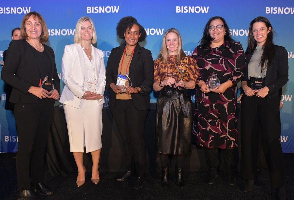 Winners of the Development, Construction and Architecture award, Cain International’s Mariana Circiumaru, Gensler’s Anna Crittenden, Lendlease’s Monique Hendley, Skidmore, Owings & Merrill’s Julia Murphy, BRP Companies’ Mary Serafy and The Domain Cos.’ Madeleine Roy onstage at Bisnow's 2023 New York Women Leading Real Estate event.
