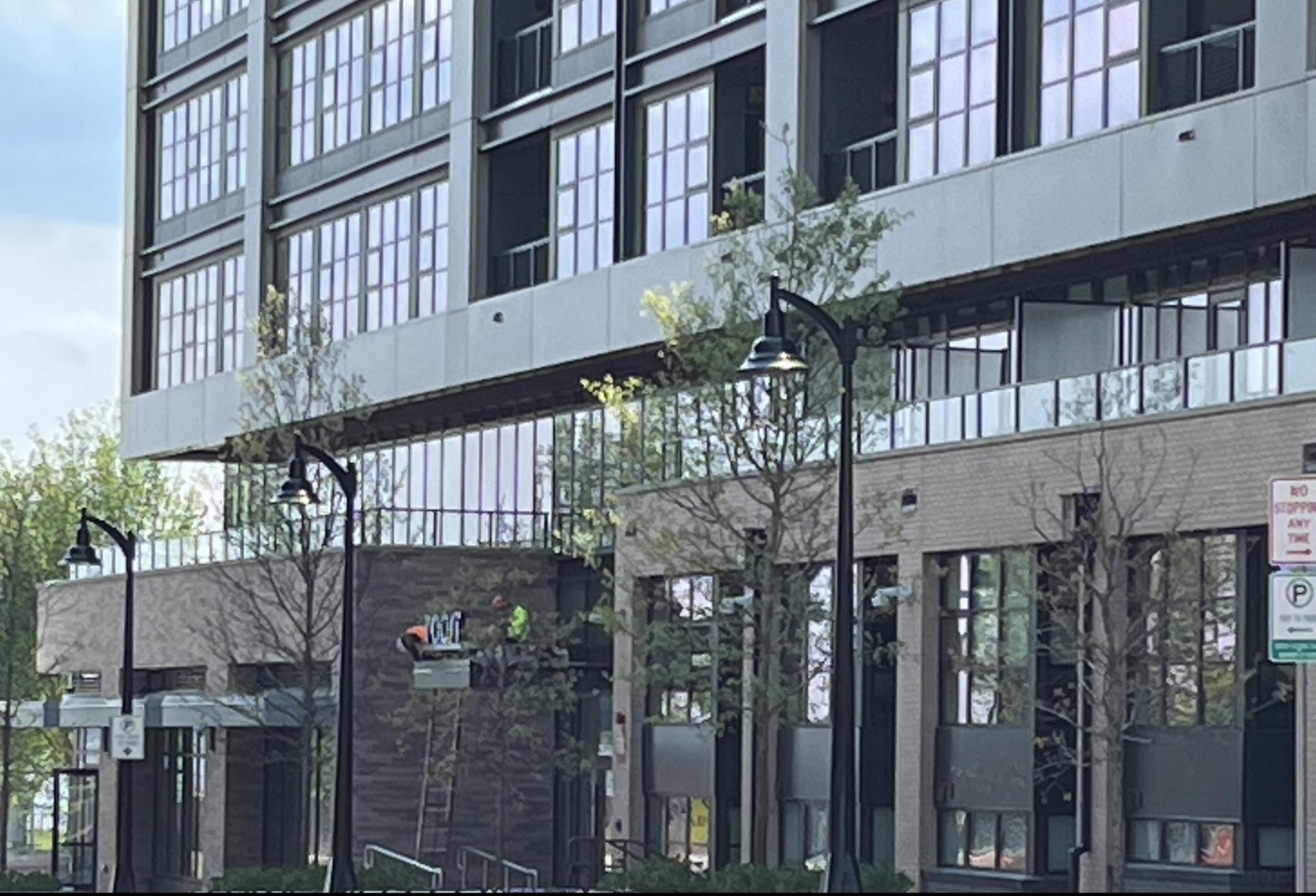 Baltimore Peninsula Team Celebrates Opening Of Roost Apartment Hotel