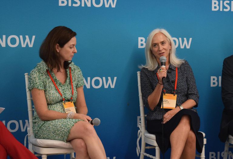 Sculptor Real Estate's Nicole Seamier and PGIM Real Estate's Cathy Marcus on stage at Bisnow's 2022 National Finance Summit.