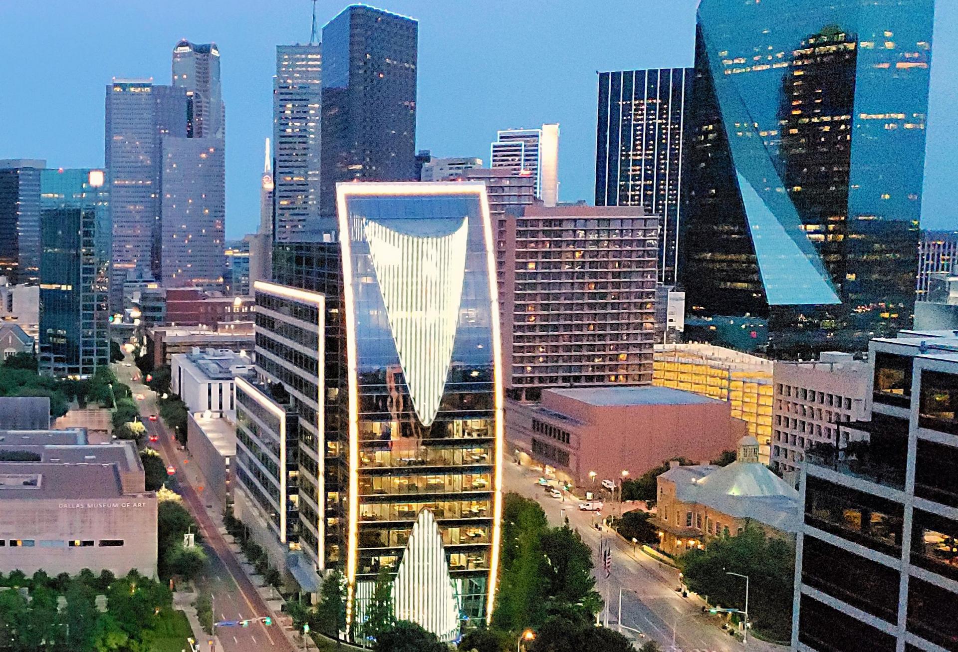 Klyde Warren Park and Dallas skyline at twilight.