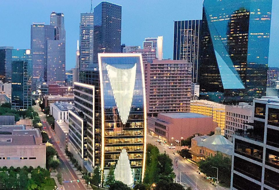 Klyde Warren Park and Dallas skyline at twilight.