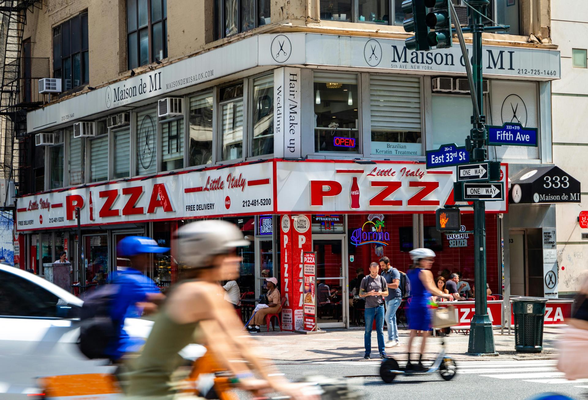 A takeout pizza slice retailer in Little Italy, New York City.
