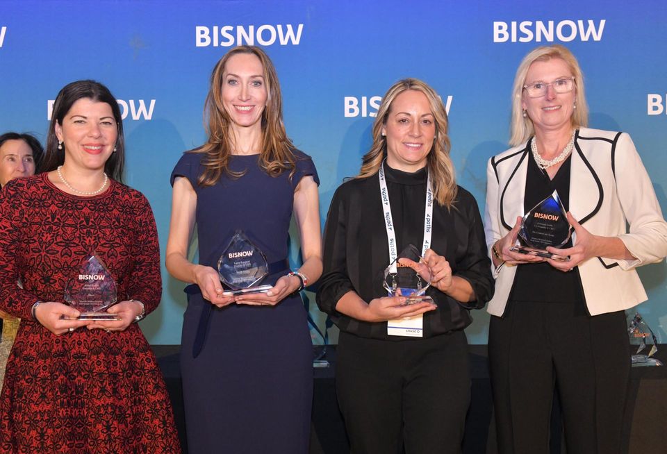 Winners of the Founders and Business Owners award, Blace’s Robin Fisher, North Bridge’s Laura Rapaport, Berlin Rosen’s Valerie Berlin and The CenterCap Group’s Deborah Smith onstage at Bisnow's 2023 New York Women Leading Real Estate event.