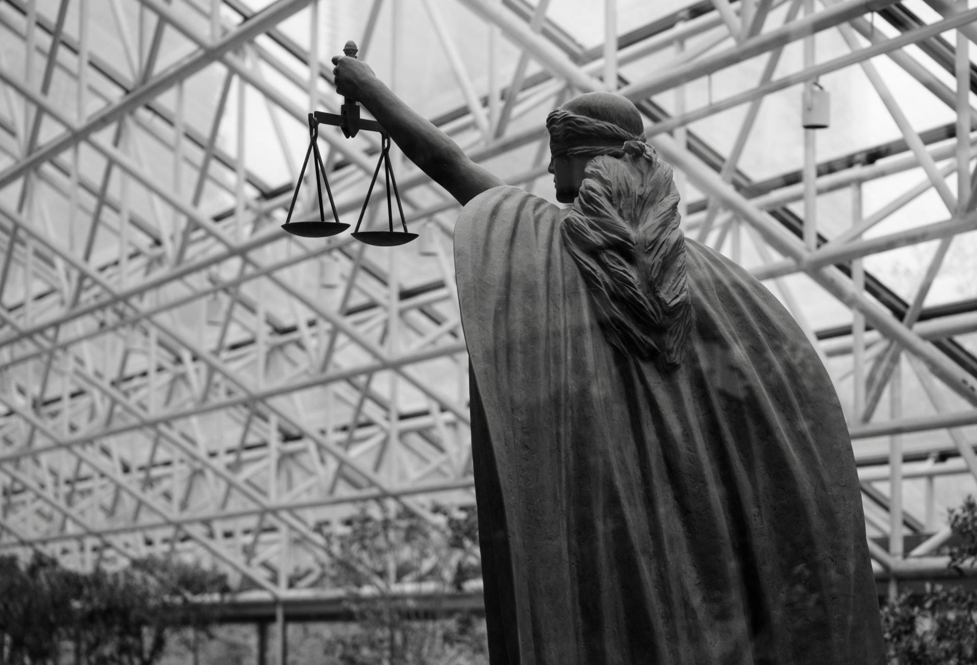 lady justice court legal lawsuit statue justice is blind
