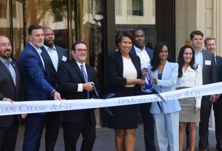 D.C. Mayor Muriel Bowser joins JPMorgan Chase executives in cutting the ribbon at their new regional headquarters in downtown D.C.