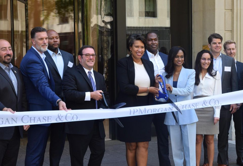 D.C. Mayor Muriel Bowser joins JPMorgan Chase executives in cutting the ribbon at their new regional headquarters in downtown D.C.