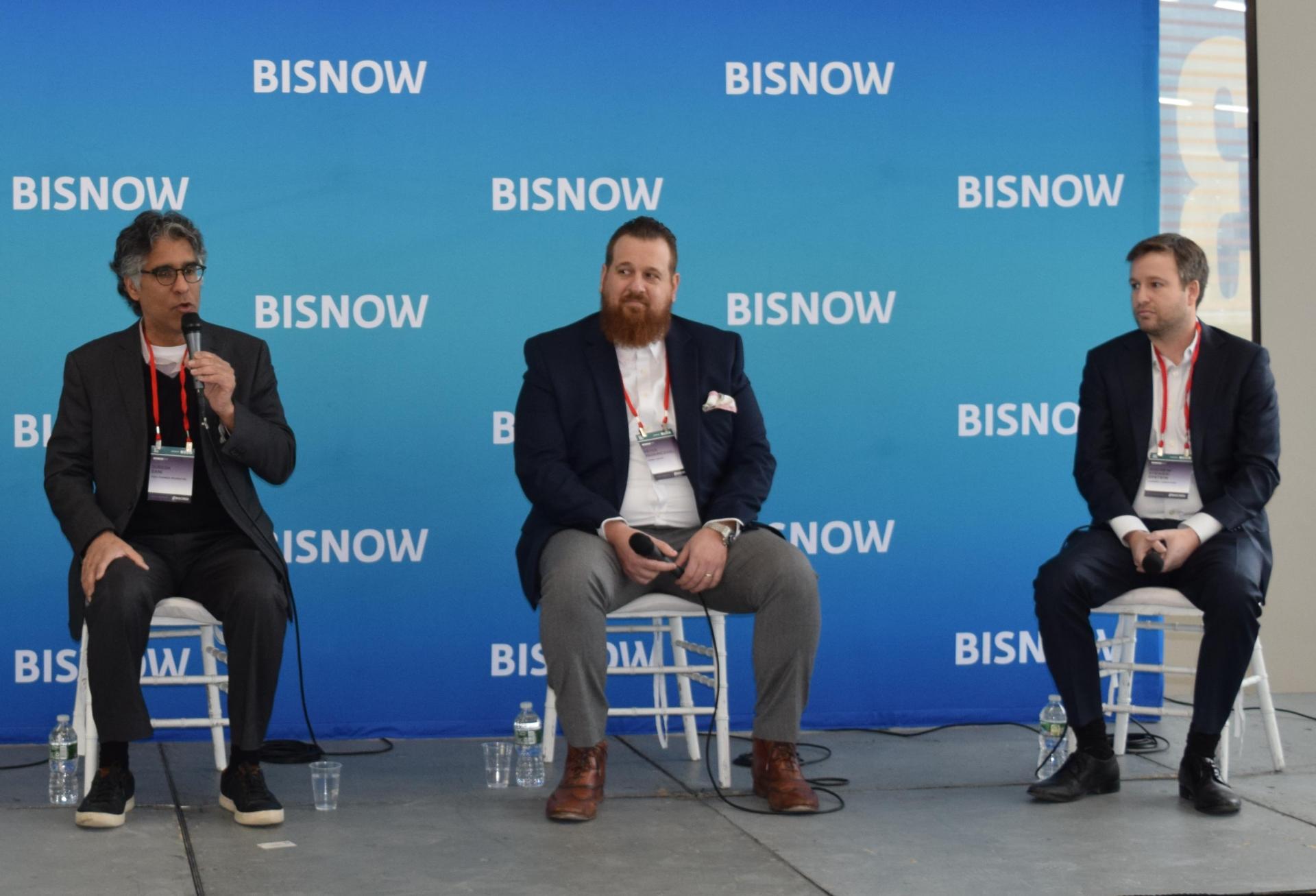 First Pioneer Properties' Suresh Sani, Vorea Group's Peter Papamicheal and Charney Co.'s Andrew Steiker-Epstein on stage at Bisnow's 2023 Long Island City and Queens State of the Market event.
