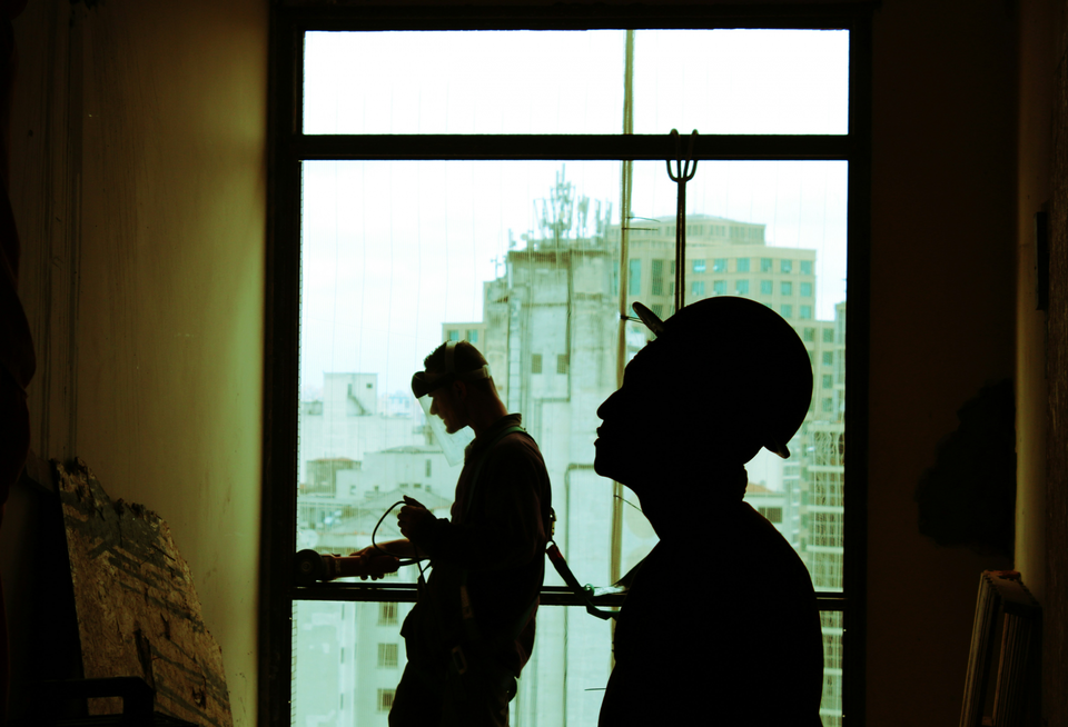 construction workers inside a building