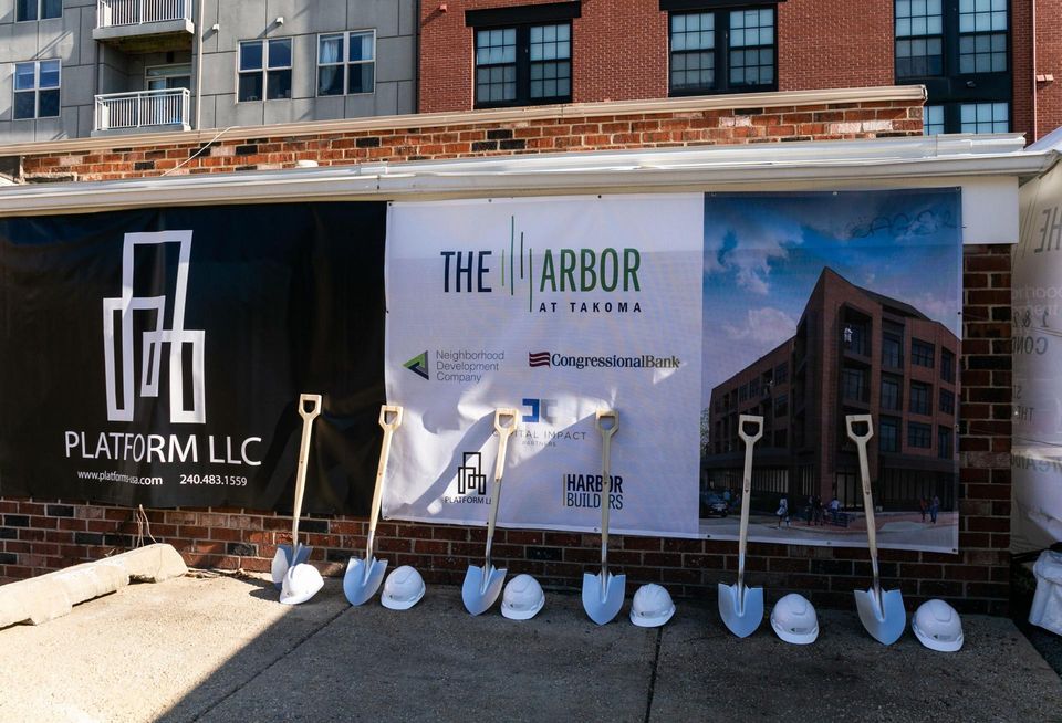 A banner advertising Platform LLC's work at The Arbor at Takoma, located at 218 Cedar Street NW.